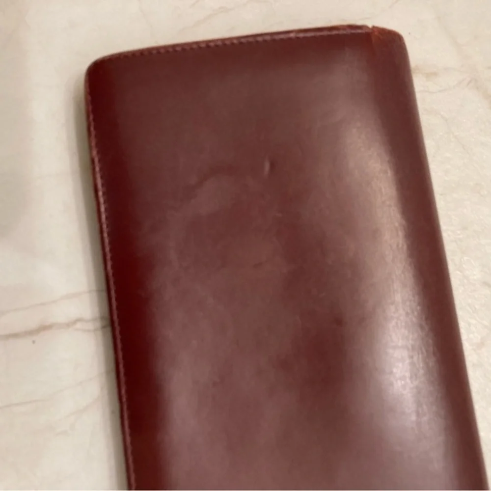 Cartier burgandy leather long slim wallet